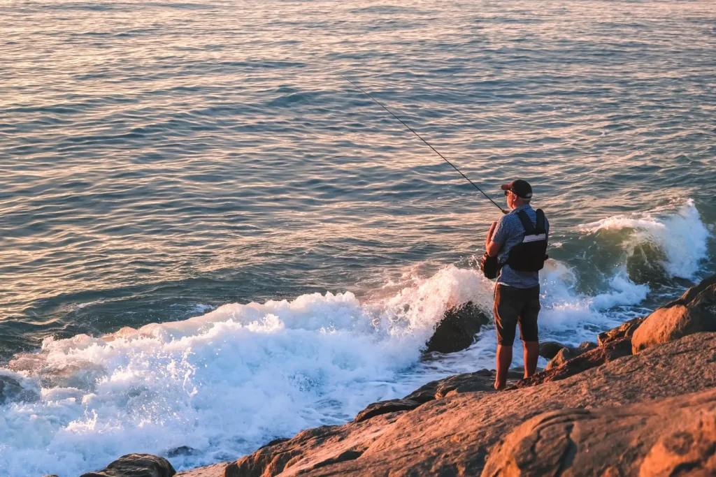 A man doing inshore fishing
